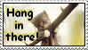 A stamp with a kitten hanging on a branch pictured on it. The text near it says 'Hang in there!'